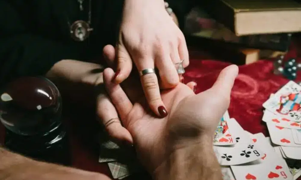 reading-lines-hand-man-s-hands-close-view_1153-5483-696×464.jpg