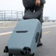 side-view-traveler-with-suitcase-scaled-1-1920×1277.jpg-900×473