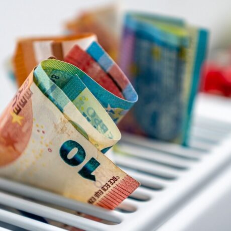 Euro,Banknotes,In,A,Central,Heating,Radiator,,The,Concept,Of