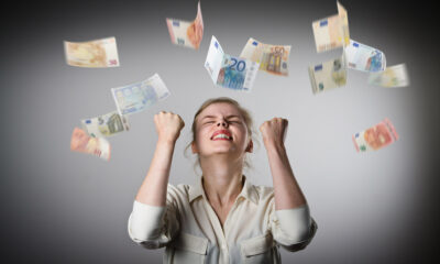 Rejoicing. Girl in white and Euro.