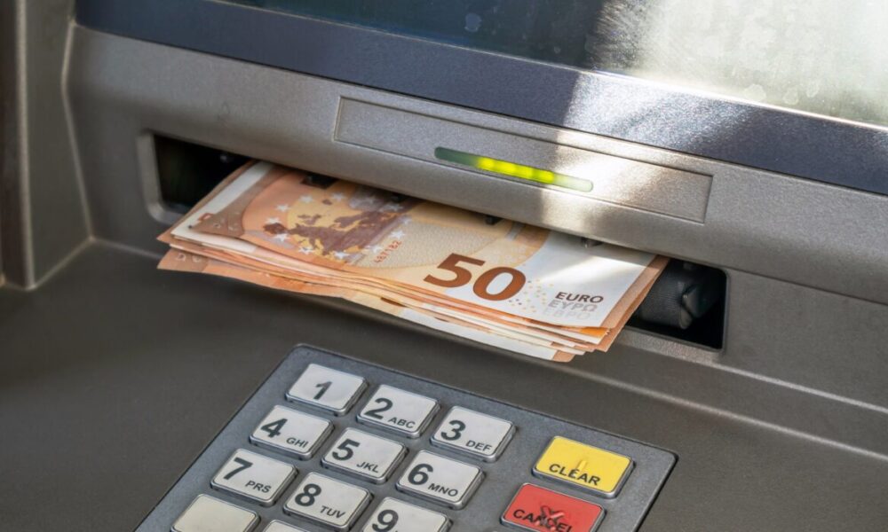 Atm,And,Cash,Money.,Euros,Withdrawal,From,An,Atm,Machine,