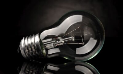 Light bulb on black background